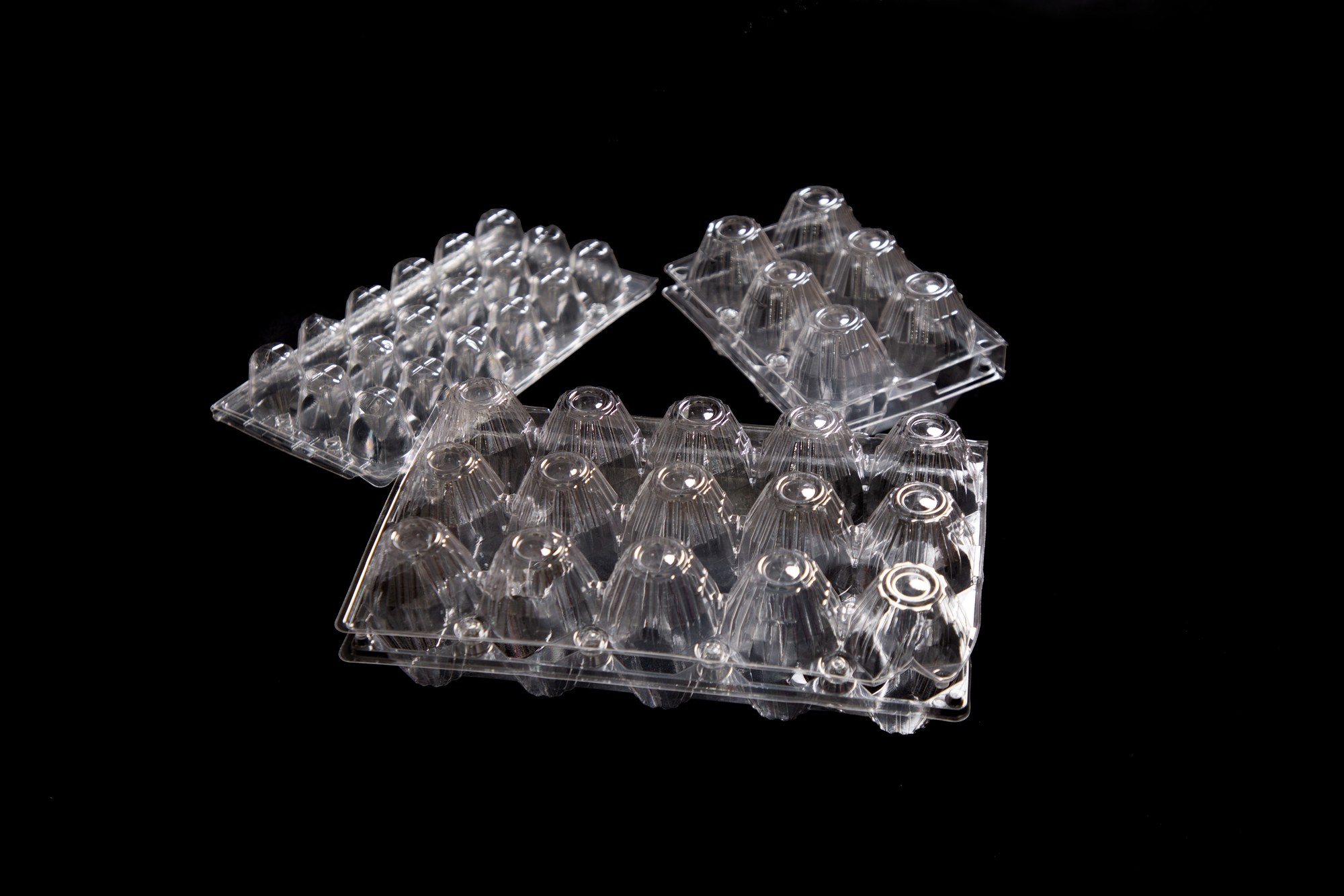 Plastic egg trays — 6-pack, 15-pack and quail 18-pack sizes for retail and wholesale egg sales